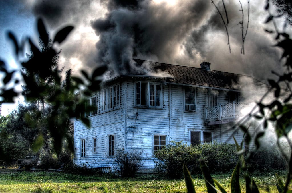 photo of a house on fire