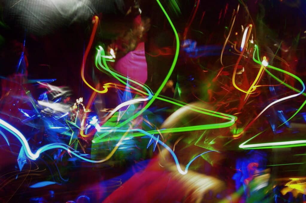 photo of streaky neon lights at nightclub