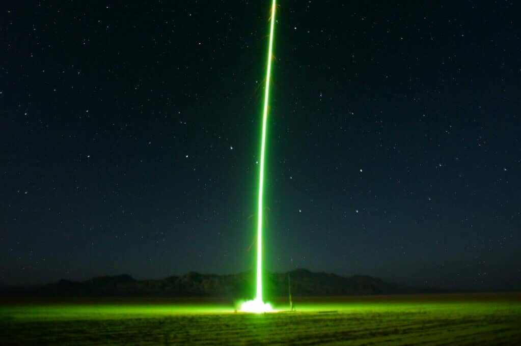 photo of nighttime rocket launch