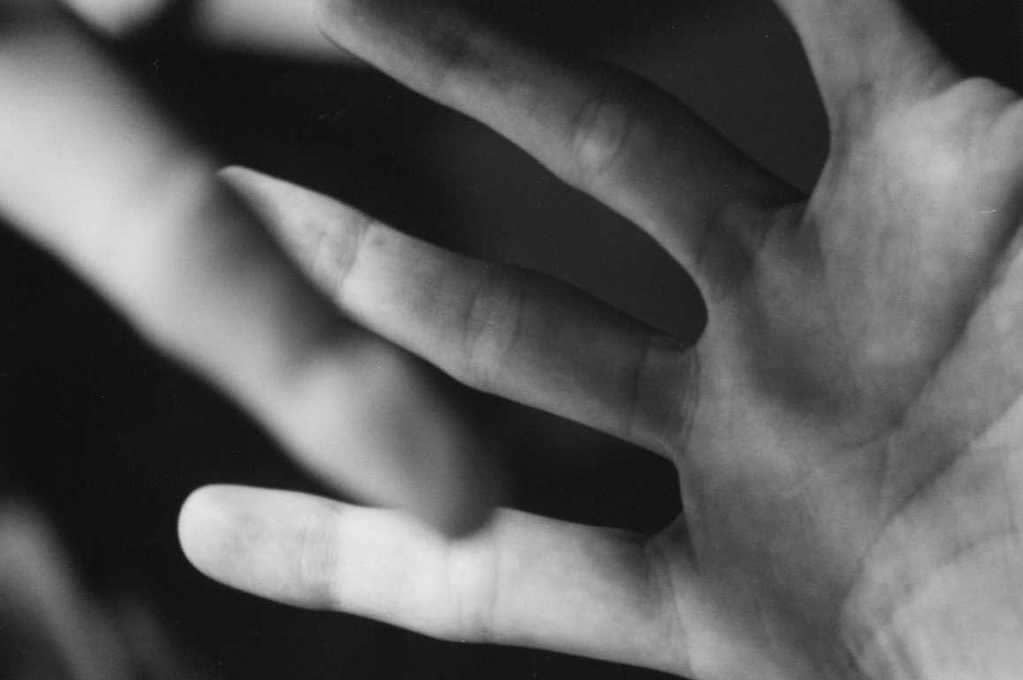 black and white photo of hands
