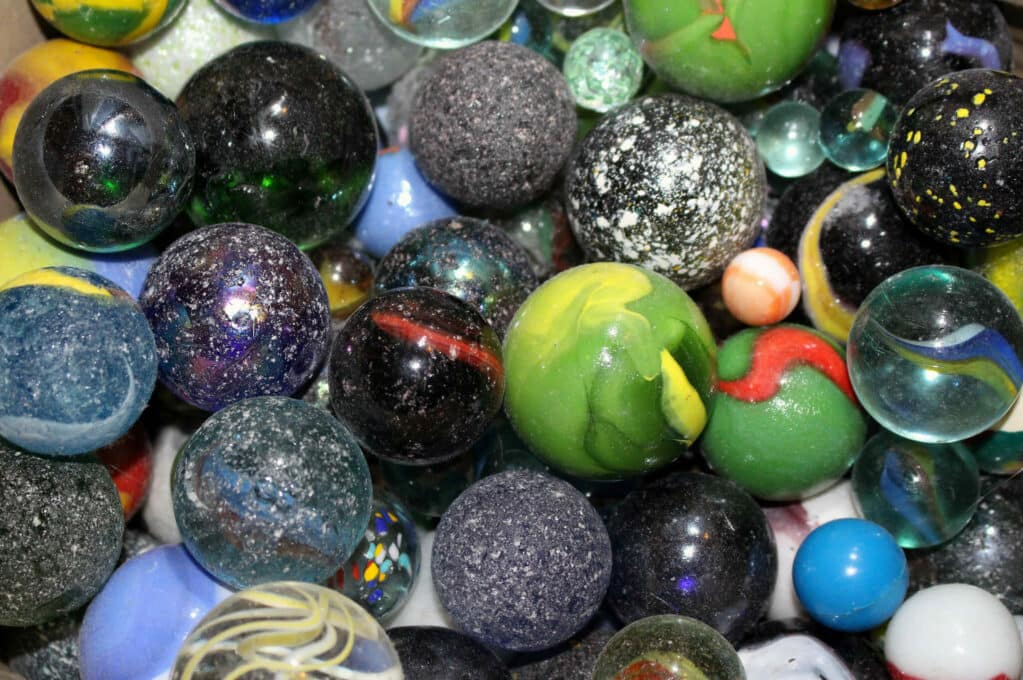 photo of different colored marbles