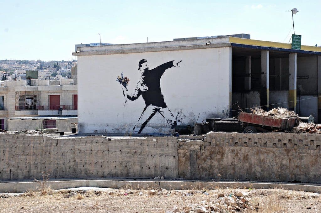 photo of banksy street art seen in beit sahour, near bethlehem