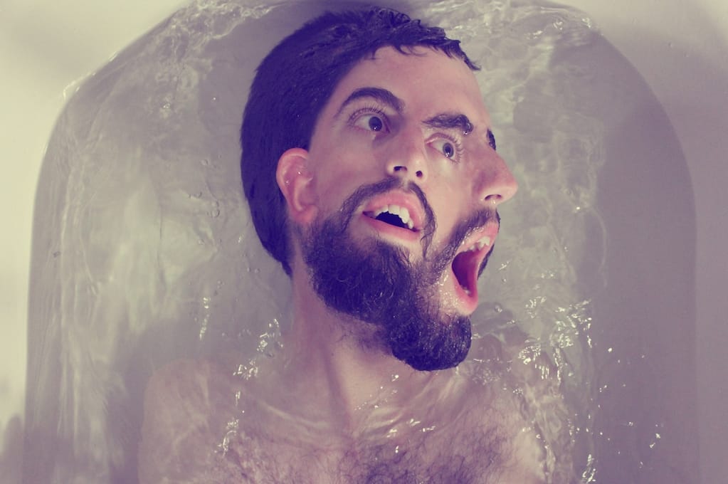 photo of a man's partially submerged face