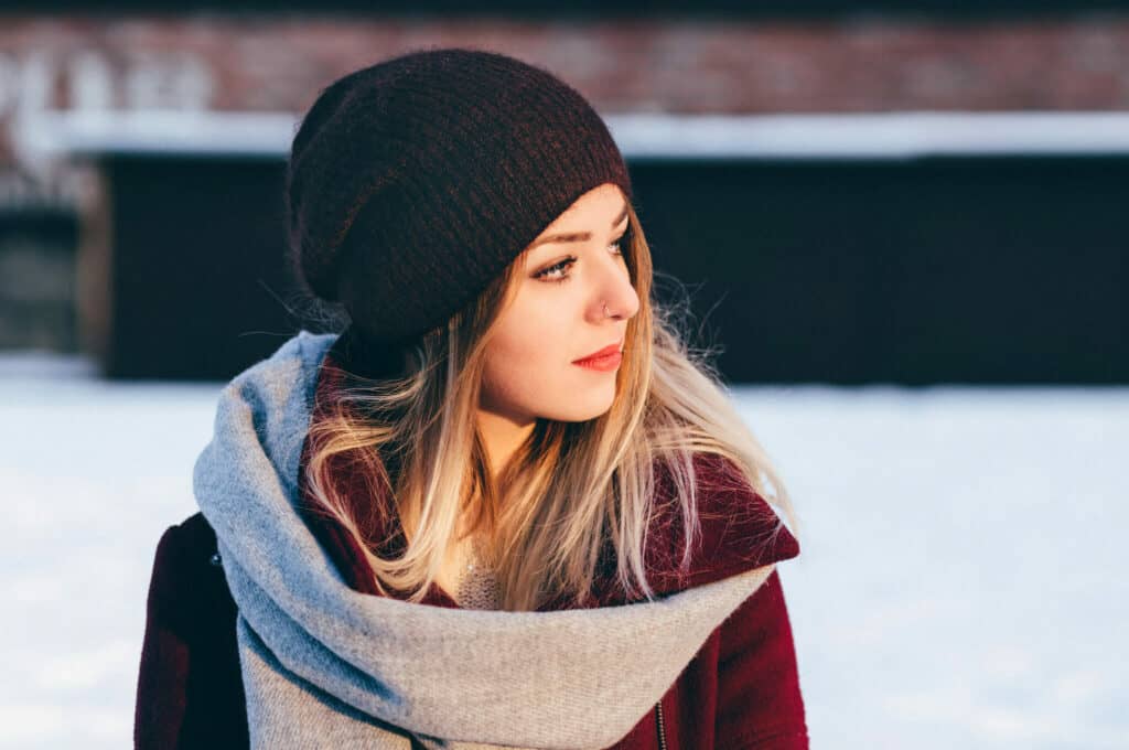 photo of a girl with nose ring in winter setting