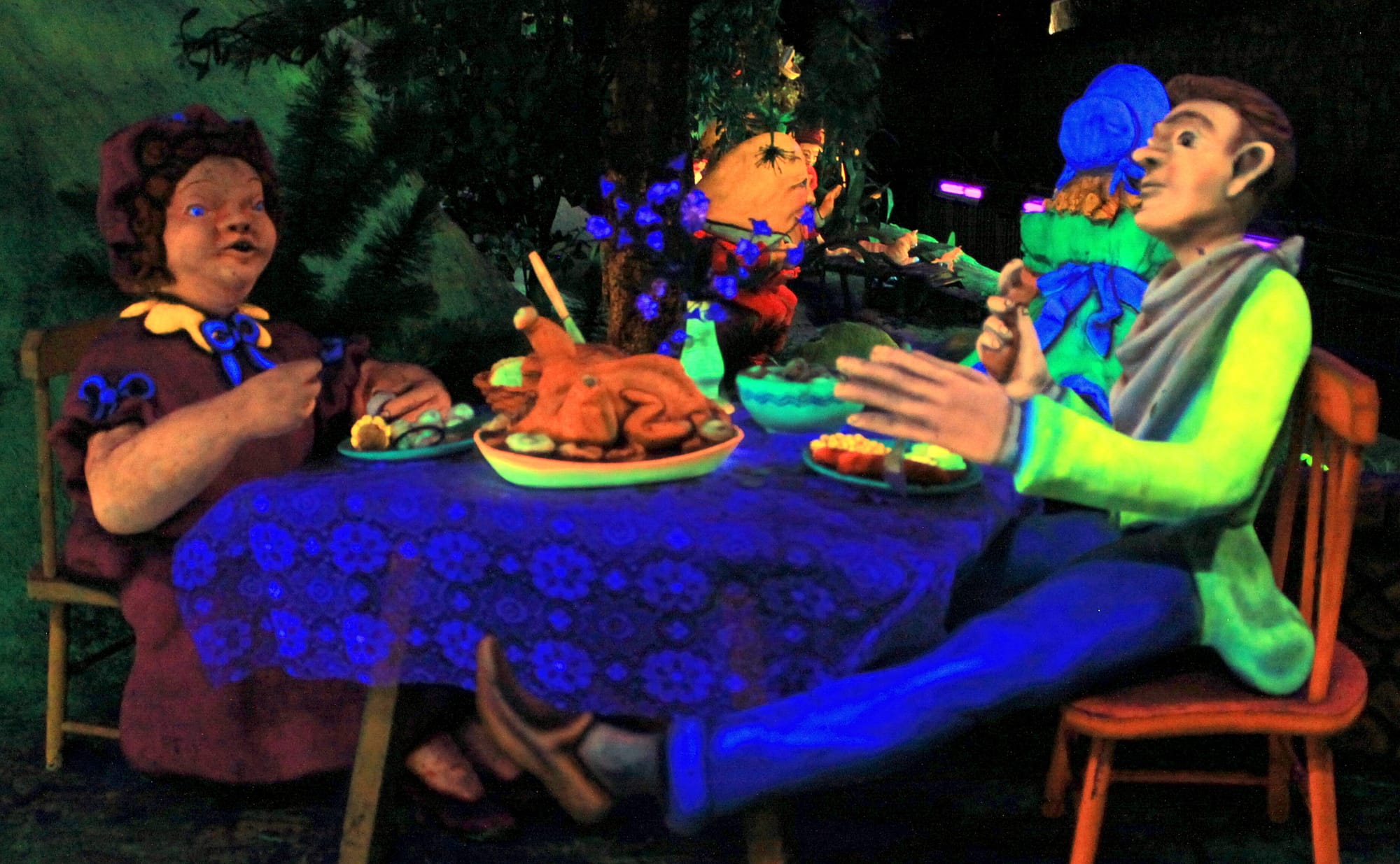 photo of a glow-in-the-dark scene from a popular fairy tale