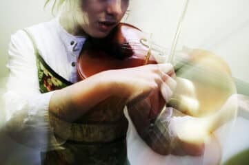 photo of girl playing violin