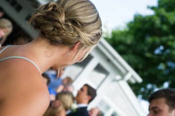 photo of the back of a girl with her hair in an updo