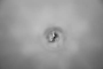photo of a person through a hole