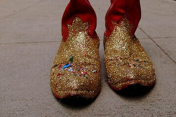photo of red cowboy boots with gold sparkles on the toes